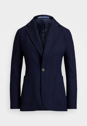 Blazer a righe navy realizzato in tessuto con una texture liscia. Presenta un colletto a scollo a V, due tasche frontali e una chiusura a un bottone.