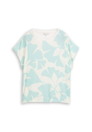 Biała koszula z krótkim rękawem o luźnym kroju, zdobiona dużymi jasnoniebieskimi abstrakcyjnymi wzorami kwiatowymi.