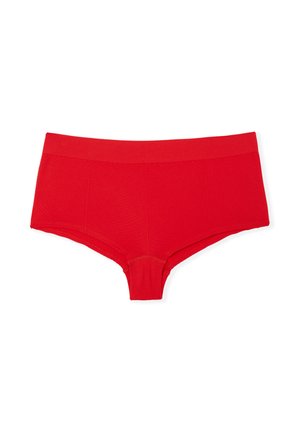Culottes hipster en coton rouge avec une ceinture lisse, présentant une couleur unie et un motif texturé subtil sur le corps.