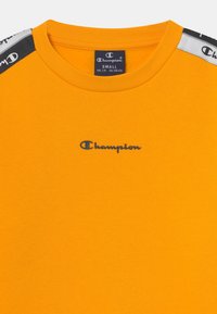 Champion AMERICAN TAPE CREWNECK UNISEX - Felpa - yellow