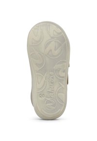 Suela de zapato de goma con un diseño texturizado. Color marrón claro, patrones de logotipos circulares y el nombre de la marca "Naturino" grabado en la superficie.