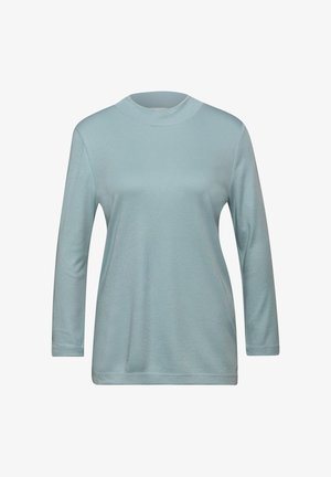 Top azzurro chiaro a maniche lunghe con collo alto. Realizzato in tessuto morbido, presenta una vestibilità rilassata e orlo dritto. Design semplice, senza motivi o decorazioni.