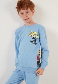 LELA REGULAR FIT - Tuta - baby blue