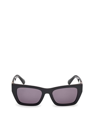 Ochelari de soare negri cu lentile pătrate și nuanță mov închis. Au un cadru elegant, mat, cu accente metalice subtile pe torsiuni.