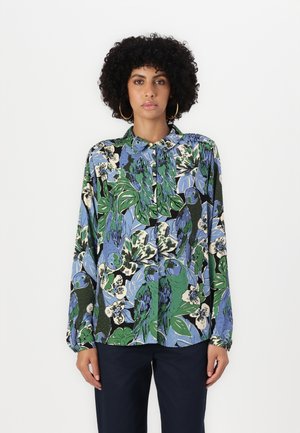 Langärmliges Button-up-Hemd mit einem mehrfarbigen Blumen- und Papageienmuster. Der Stoff hat eine glatte Textur; die Farben umfassen Grün, Blau und Schwarz.