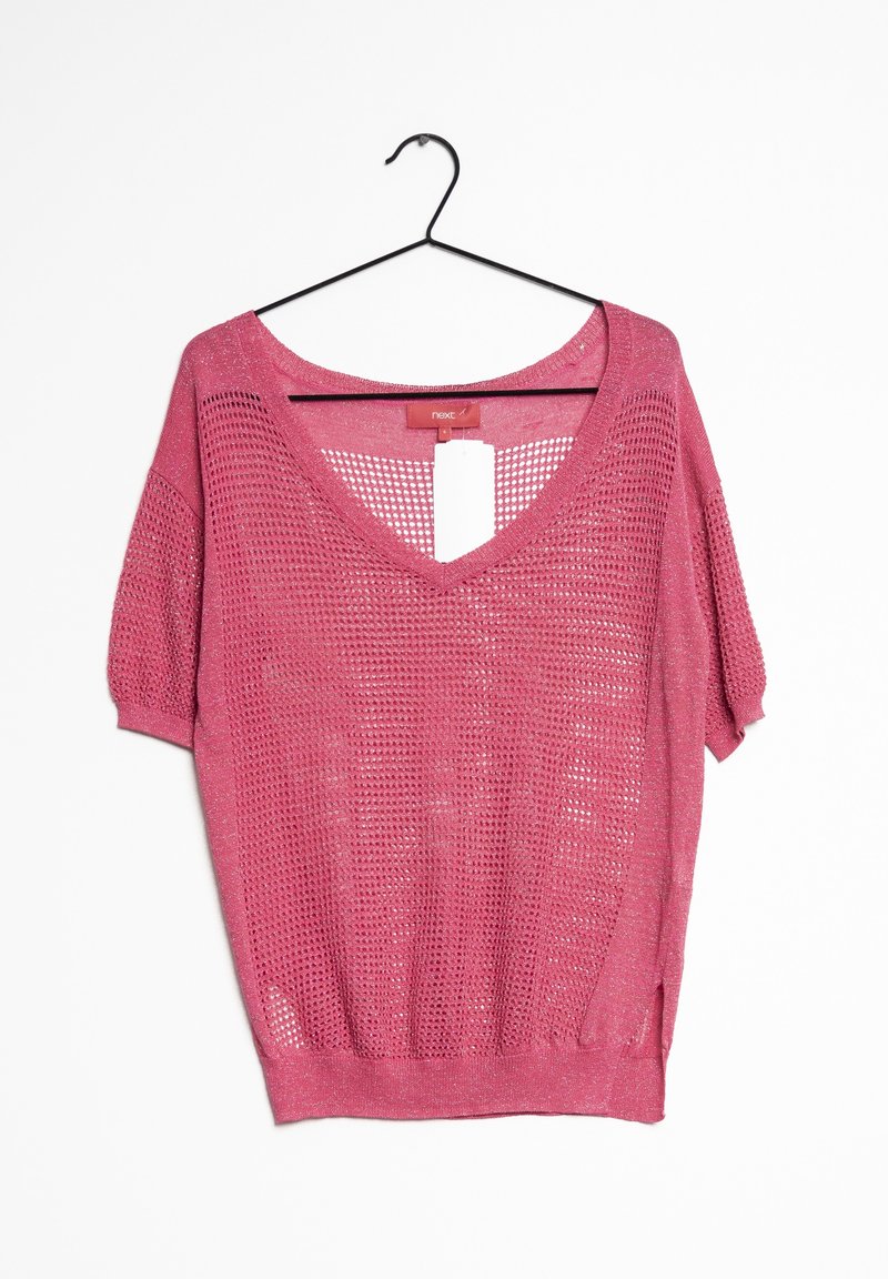 Lyserød v-hals, løst strikket sweater med korte ærmer. Fremstillet af letvægtsmateriale, har ribbet kant og sideslidser. Etiketten er synlig.