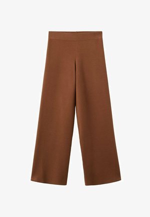 Pantaloni larghi marroni realizzati in un tessuto morbido e texturizzato. Presentano una vita alta e elastica e cadono liberamente fino alla caviglia.