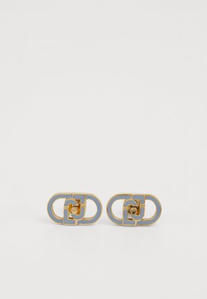 Boucles d'oreilles en métal doré mettant en avant une forme ovale abstraite avec un design découpé et des accents bleu clair. Texture lisse avec une finition polie.