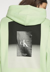 Calvin Klein Jeans OVERSIZED HOODIE - Felpa con cappuccio - exotic mint