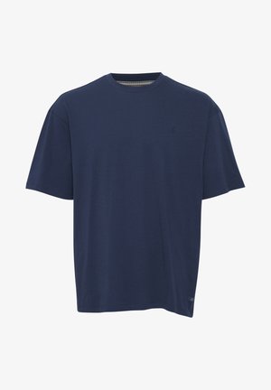 Navy blue cotton T-shirt with short sleeves, round neck, and subtle logo detail on the chest, featuring a relaxed, boxy fit.