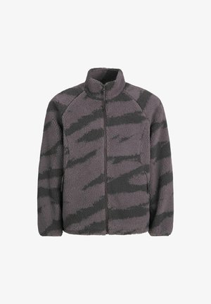 Fliisjakki, millel on kõrge kaelus, tõmblukk ja halli ning musta triibuline muster. Pehme tekstuur raglanvarrukatega ja küljetaskudega.