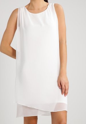 Weißes ärmelloses Shift-Kleid aus leichtem Stoff, mit lockerem Sitz, rundem Ausschnitt und asymmetrischem Saum.