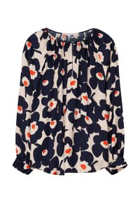 Blus med lång ärm i marinblått och krämvitt med stort blommönster, som har röda och vita accenter, elastisk halsringning och knappade manschetter.