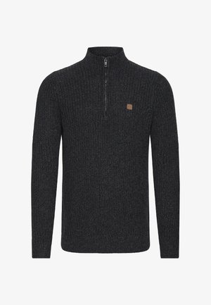 Suéter de punto con cremallera en gris oscuro, con un patrón texturizado, cuello alto y un pequeño logo de cuero cuadrado en el pecho.