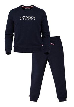 Felpa blu navy Tommy Hilfiger e pantaloni jogger abbinati con scritta del logo sul petto e dettaglio con coulisse rosso-bianco-blu.