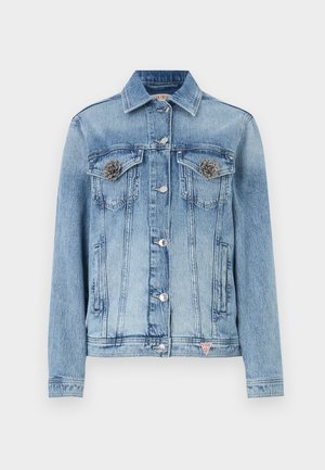 Ljusblå denimjacka med silverfärgade blomdetaljer på bröstfickorna, knappstängning och kontrastsömmar. Klassisk krage och figursydd design.