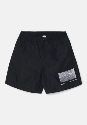 Black shorts made of lightweight fabric featuring an elastic waistband, a snap button, and a side patch with a water pattern graphic.