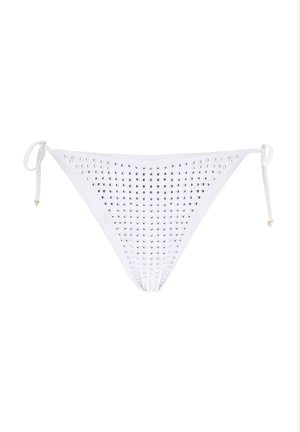 White bikini bottom with silver studs arranged in a pattern. Ties on the sides with gold accents at the end of the ties.