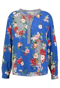 Blusa blu a maniche lunghe con stampa floreale colorata e righe verticali in bianco e nero sul colletto, sul placket e in sezioni sparse sulle maniche e sul corpo.
