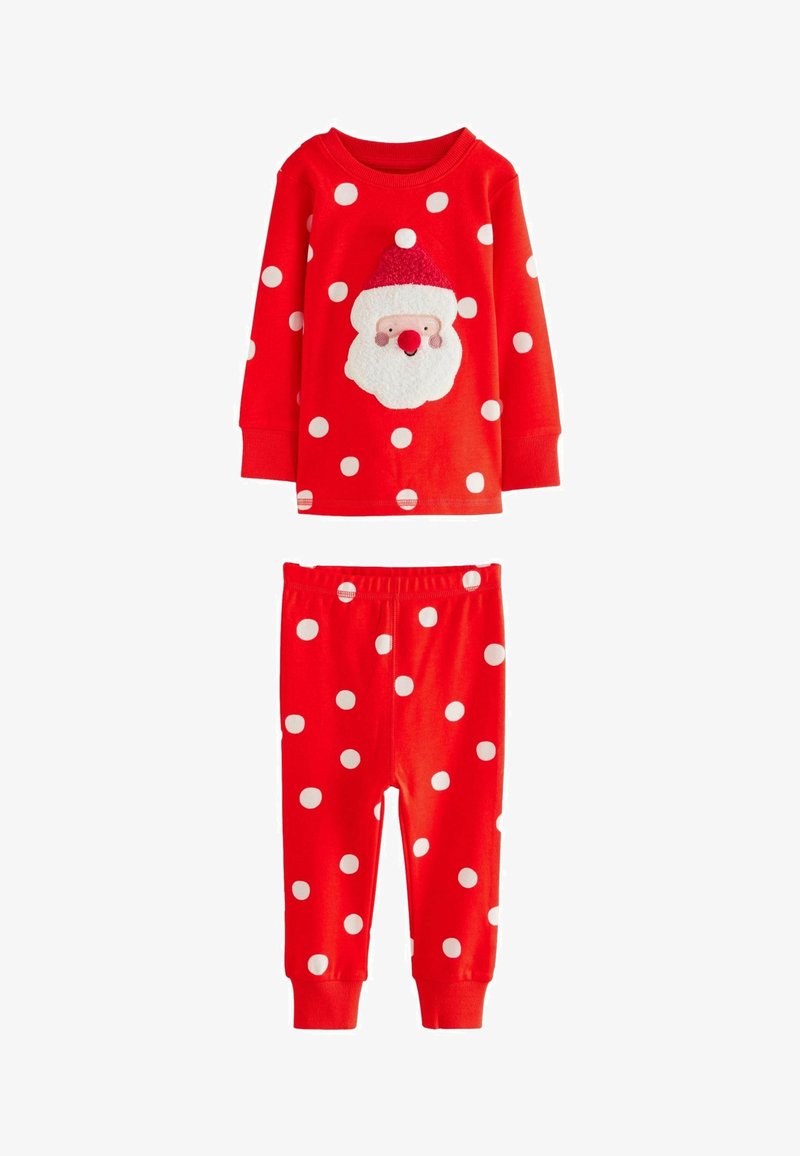 Ensemble de pyjama rouge avec des pois blancs ; le haut présente un visage de Santa en peluche. Manches longues et taille élastique sur le pantalon pour le confort.