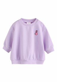 Sudadera lilas de manga corta, con puños y cintura acanalados, con un pequeño bordado de un conejo rosa en el pecho izquierdo.
