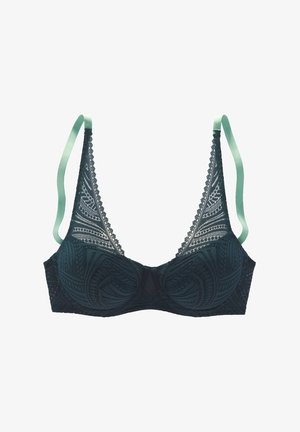 Tamnozeleni čipkani grudnjak s dubokim izrezom, dekorativnim šavovima i mekim trakama u boji mente. Ima teksturirani geometrijski uzorak.