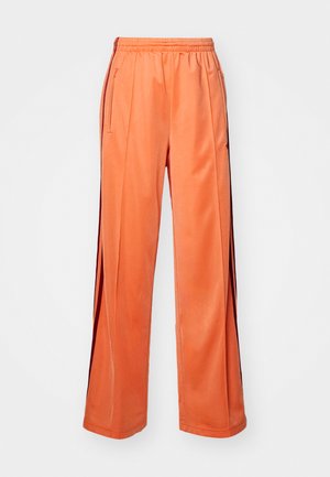 adidas Originals FIREBIRD - Tracksuit bottoms - semi coral/team victory red