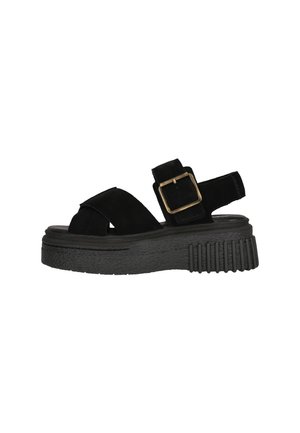 Sandalo in suede nero con design a strisce incrociate, fibbia regolabile e suola piattaforma spessa con texture rigata.
