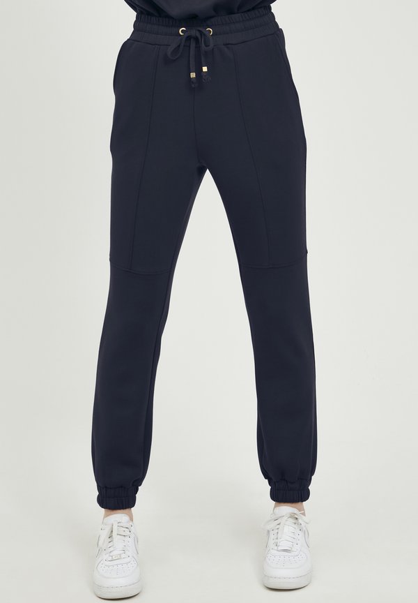 BYPusti - Tracksuit bottoms - peacoat