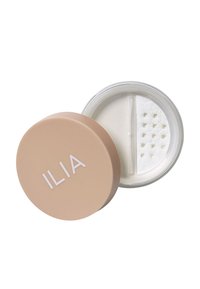 Genomskinligt löspuder i en beige behållare med ett klart lock. Behållaren har en vit logotyp och en separator inuti för enkel utmatning.