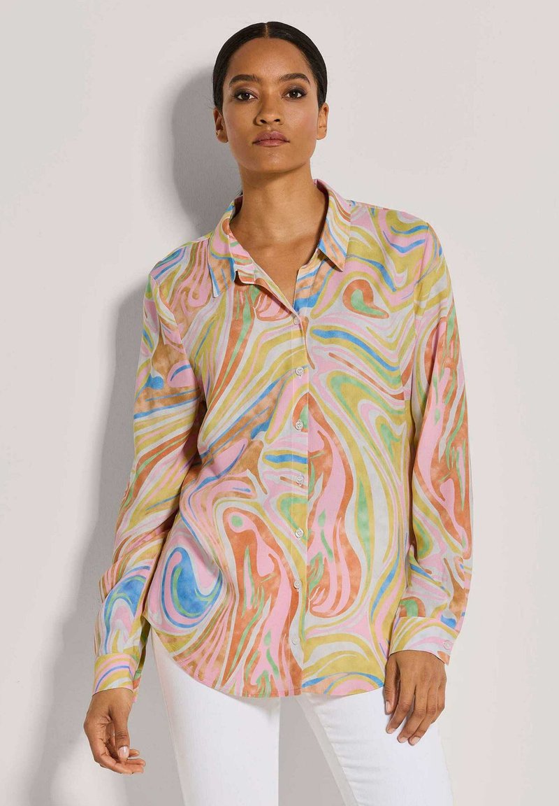 Buntes Langarmhemd mit einem wirbelnden abstrakten Muster in Pink, Gelb, Grün und Blau. Weicher Stoff, knöpfbares Design und Kragen.