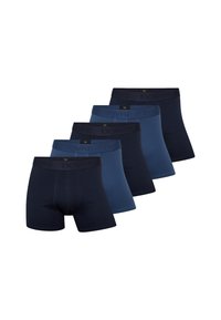 Fem par DOVRE drenge boxerbukser i forskellige nuancer af blå og marineblå, med en blød elastisk talje og en glat stofstruktur.