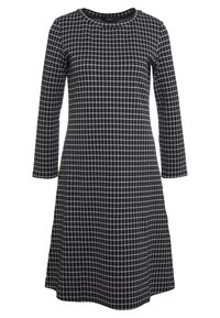 Černobílé kostkované šaty s dlouhými rukávy, kulatým výstřihem a rozšířeným spodním lemem. Vyrobené z texturované látky s přiléhavým korzetem.
