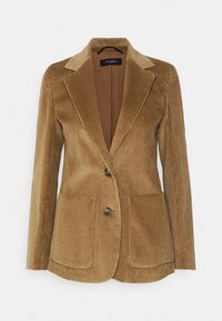 Brun kordfløjl blazer med indsatte klapper, to frontlommer og to knapper. Vertikal ribbet tekstur med en glat inderside.
