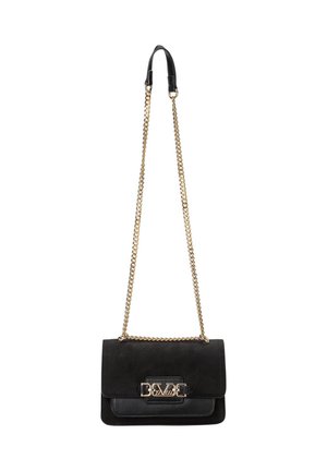 Black handbag with suede and leather materials, gold chain strap, rectangular shape, fold-over flap, and decorative gold hardware detail.