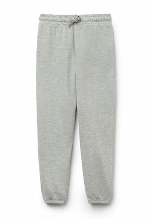 Pantalons de jogging gris clair en tissu doux. Dotés d'une taille élastique avec cordon de serrage et de poignets élastiques aux chevilles. Design décontracté.