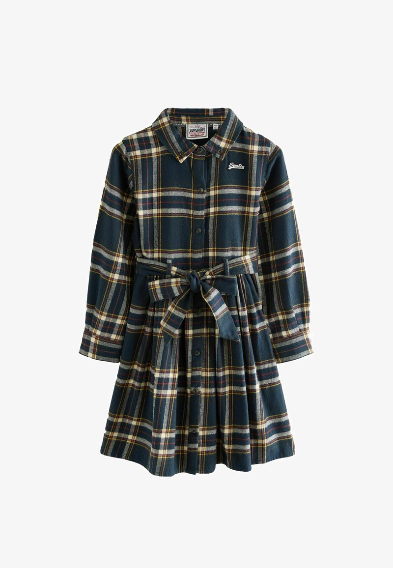 Sukienka flanelowa w ciemnoniebieskim kolorze z żółtą, czerwoną i białą kratką. Posiada zapięcie na guziki z przodu, kołnierzyk oraz pasek do wiązania w talii.