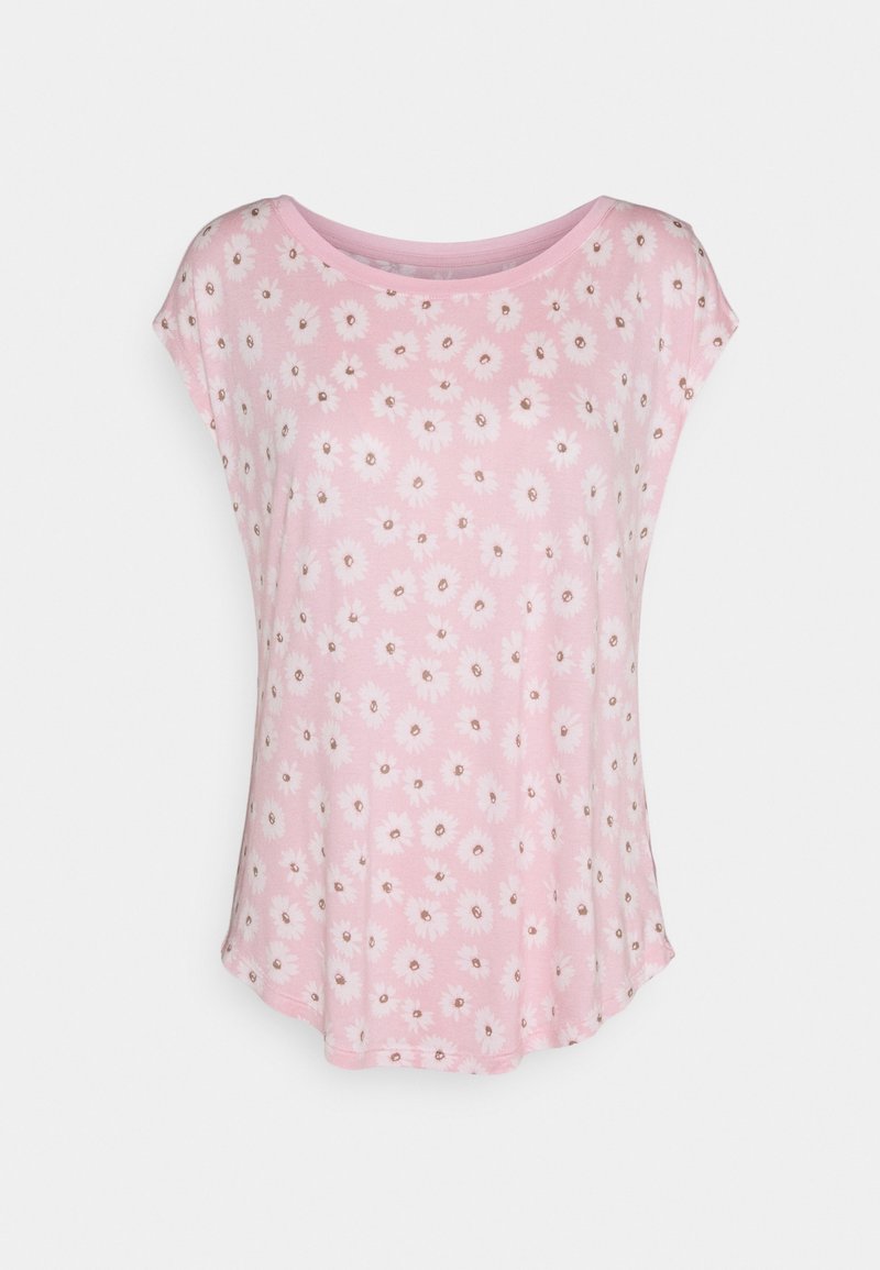 Haut pour femmes rose à manches courtes avec un motif de fleurs de marguerite blanches et un col rond sur fond blanc.