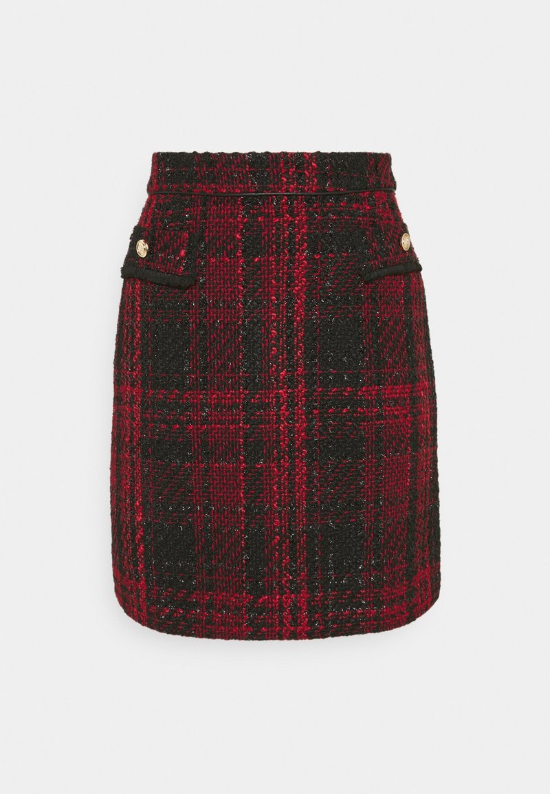Mini-jupe en mélange de laine à carreaux rouge et noir, taille haute, avec deux poches avant à rabat et boutons dorés.