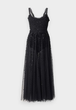 Zwarte mouwloze lange jurk met spaghettibandjes, textuur bodice en doorschijnende rok versierd met verspreide pailletten.