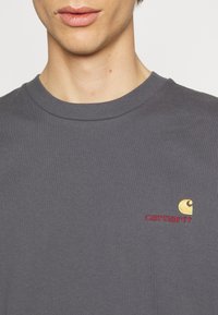 Carhartt WIP AMERICAN SCRIPT - Základné tričko - zeus
