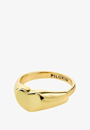 Gold-tone ring featuring a heart-shaped design, smooth surface, and a polished finish with the brand name "PILGRIM" engraved inside.