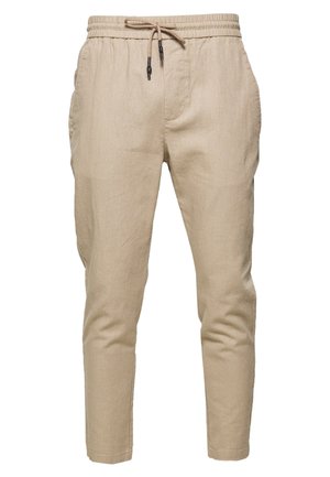 Beige kileskårede linnedbukser med elastik i taljen og justerbar snøre, med sidelommer og løs pasform.