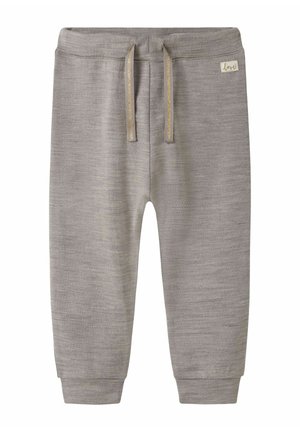 Pantalon de survêtement gris en tissu doux et texturé, avec une taille élastique ornée de cordons beiges et des poignets côtelés aux chevilles.
