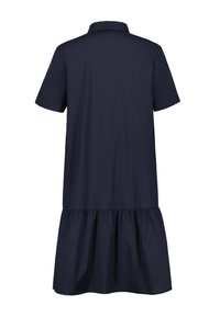 Navyblauw kortomarmig jurkje met een kraag en een uitlopende gerimpelde zoom. Gemaakt van een soepele, lichte stof. Eenvoudig ontwerp.