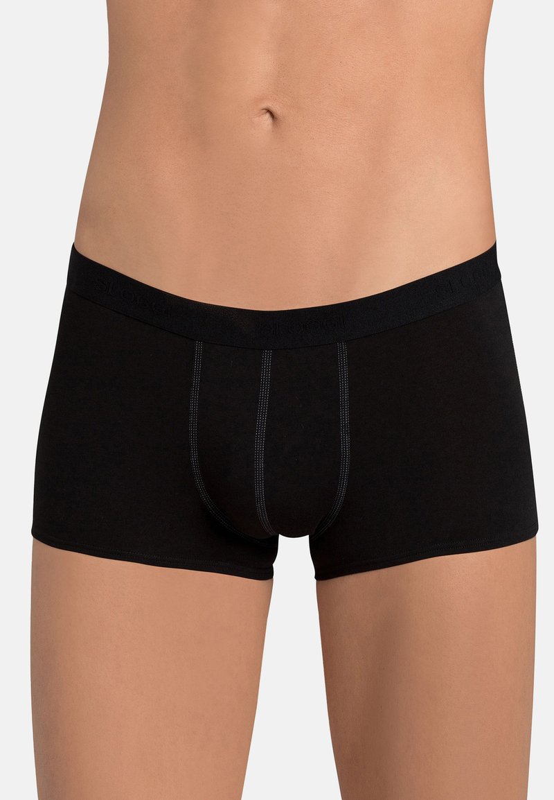 Black boxer briefs made of soft fabric with a fitted design, featuring contrasting stitching along the seams and a branded waistband.