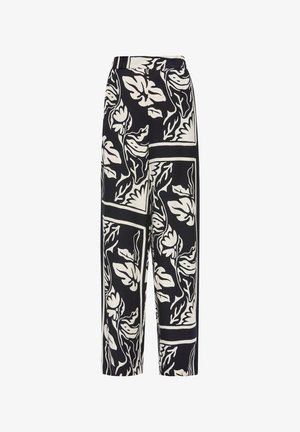 Szerokie spodnie z czarno-kremowym wzorem w kwiaty, o luźnym kroju i płaskim pasie dla wygody.