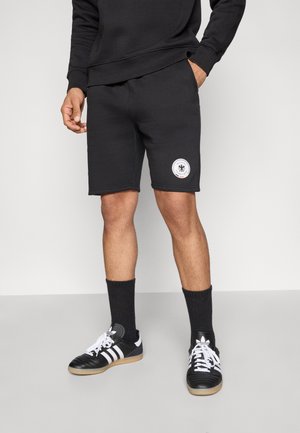 DFB PRIMARY LOGO GRAPHIC SWEAT SHORT - Pelipaita - black