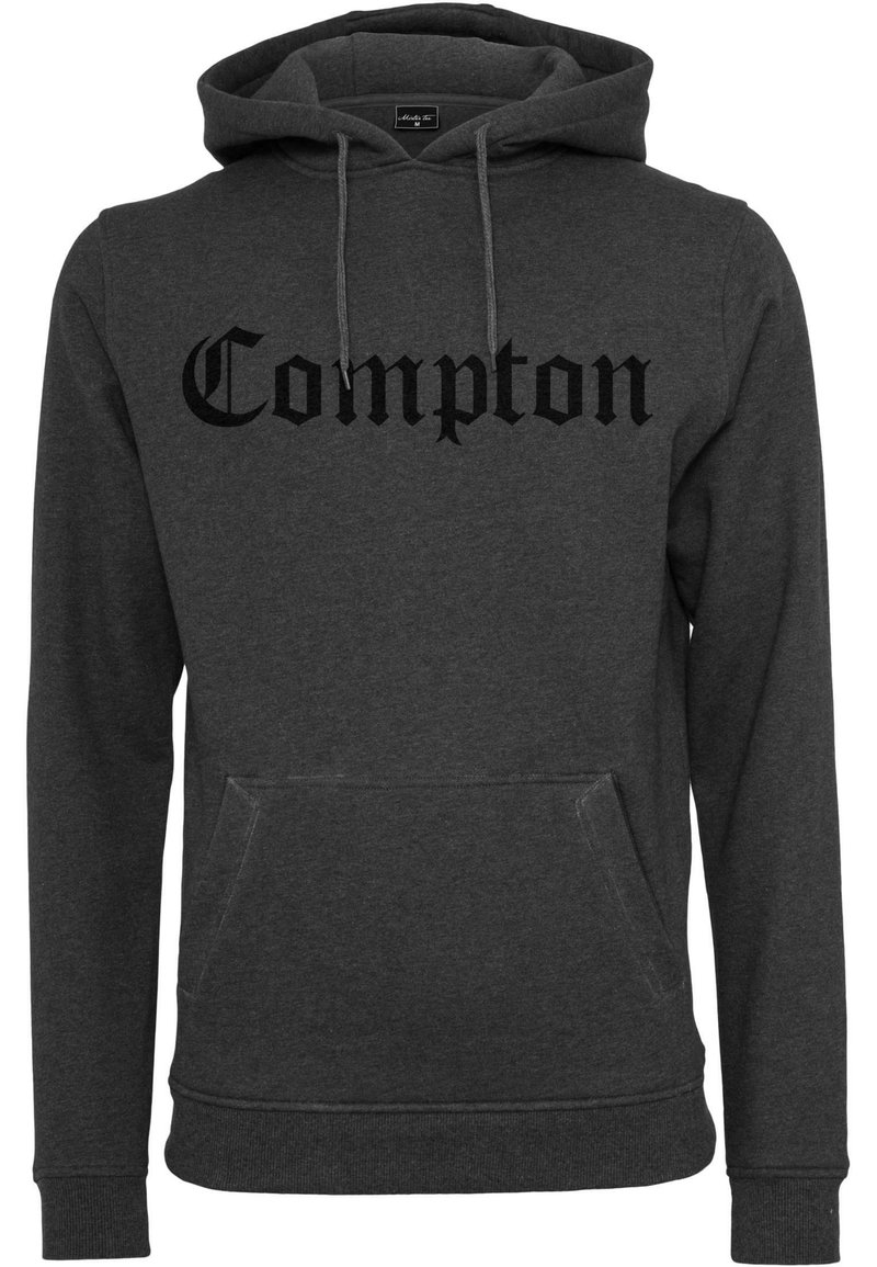 Sudadera con capucha de color gris oscuro en una tela suave, con un bolsillo frontal y el texto "Compton" en negro en una fuente audaz y estilizada.