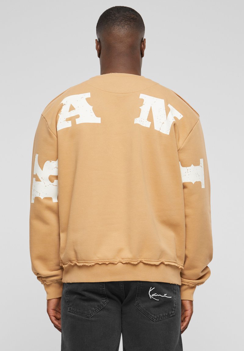 Karl Kani - SMALL SIGNATURE DISTRESSED OS CREW - Mikina - sand, Zvětšit